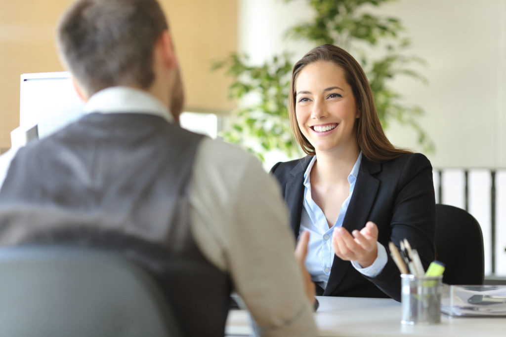 business man and woman during a loan transaction